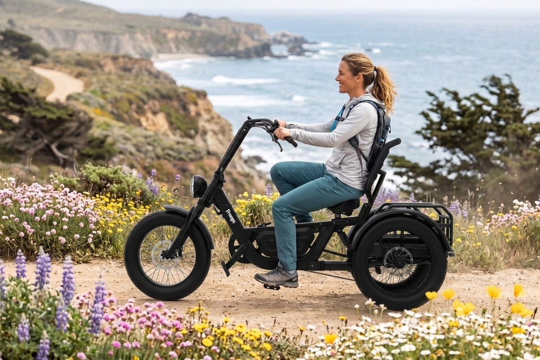 Woman riding electric trike featuring solid electric trike range by the ocean.