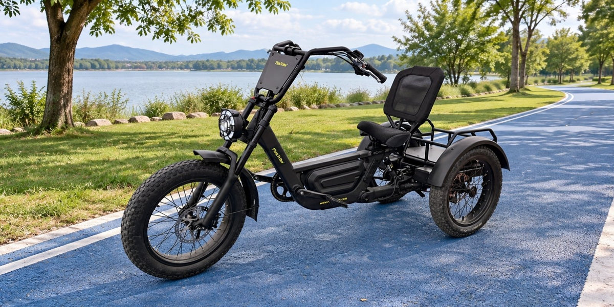 E-Trike Guide about FlekTrike Pro
featuring the FlekTrike Pro All-Terrain
Tilting eTrike parked outside a residential
garage.