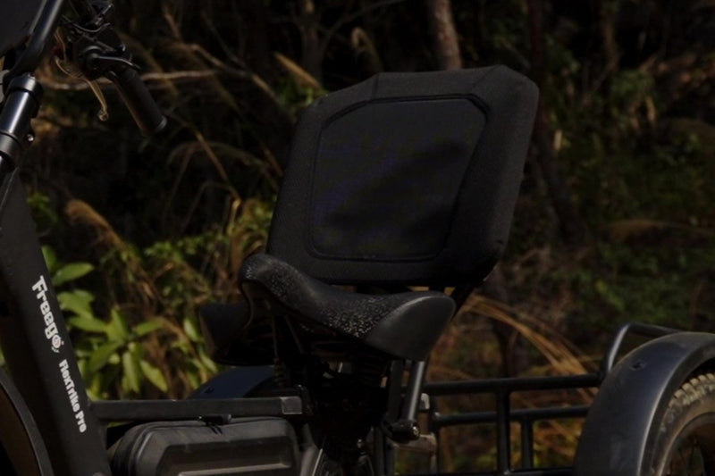 Close-up of a freego flextrike pro saddle with a blurred natural background