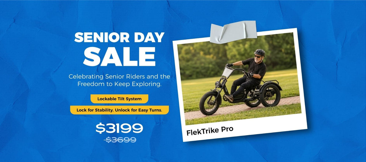 Senior Day Sale wide banner featuring the FlekTrike Pro All-Terrain Tilting eTrike at $3,199 , with "Celebrating Senior Riders and the Freedom to Keep Exploring" headline, Lockable Tilt System highlight, senior rider photo, and blue background.